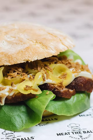 The Classic Amsterdammertje — Gehaktbal, smoked mayo, pickled onions.